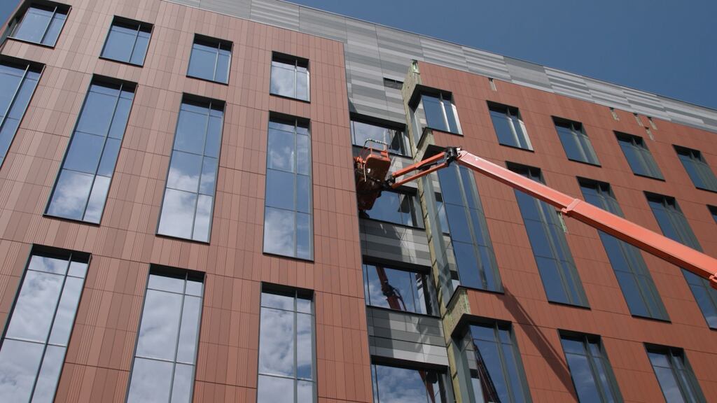 Construction is almost complete on a new R.I. state health lab, which will be topped by incubator space for biotech companies, and three floors of commercial space. 