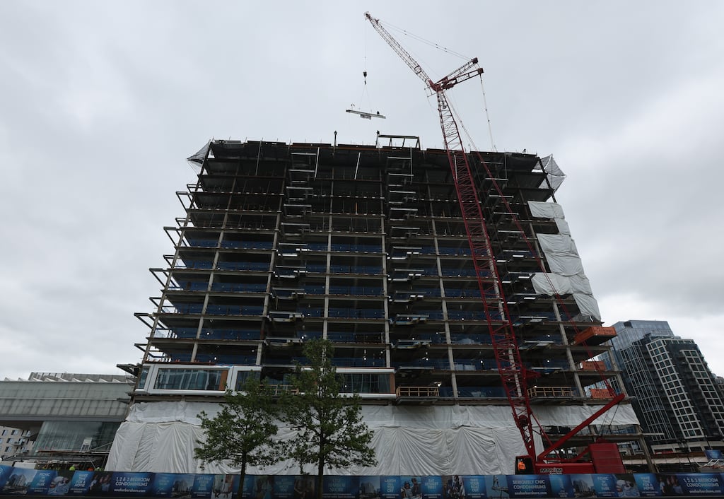 The Fallon Co. celebrated a topping-off ceremony for its 122-condo tower at Fan Pier on May 23.