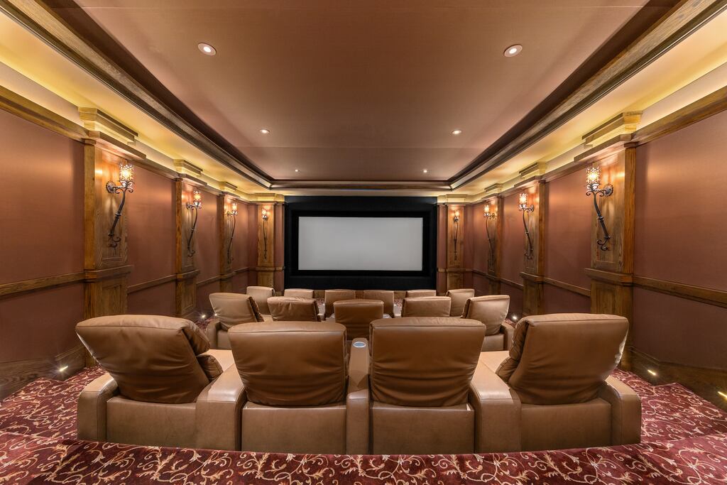 The home theater boasts comfy seating.