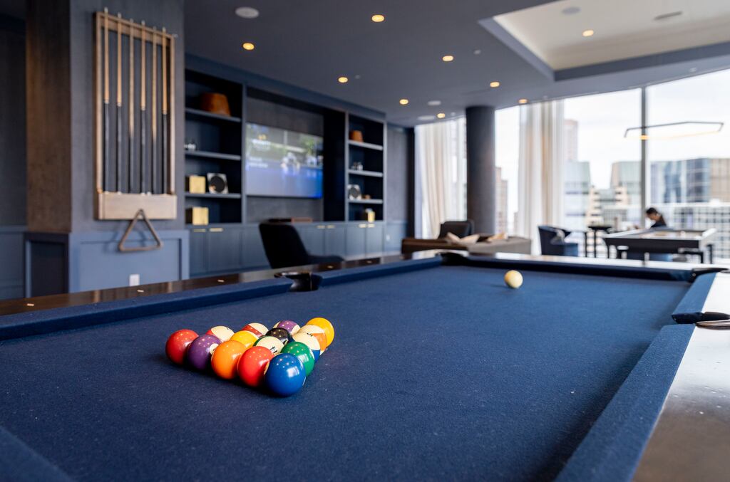 The game room in The Millennium Residences at Winthrop Center.