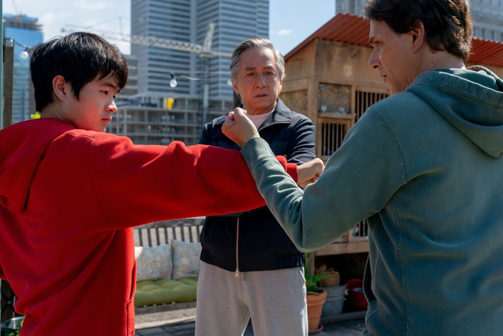 From left: Ben Wang, Jackie Chan, and Ralph Macchio in 