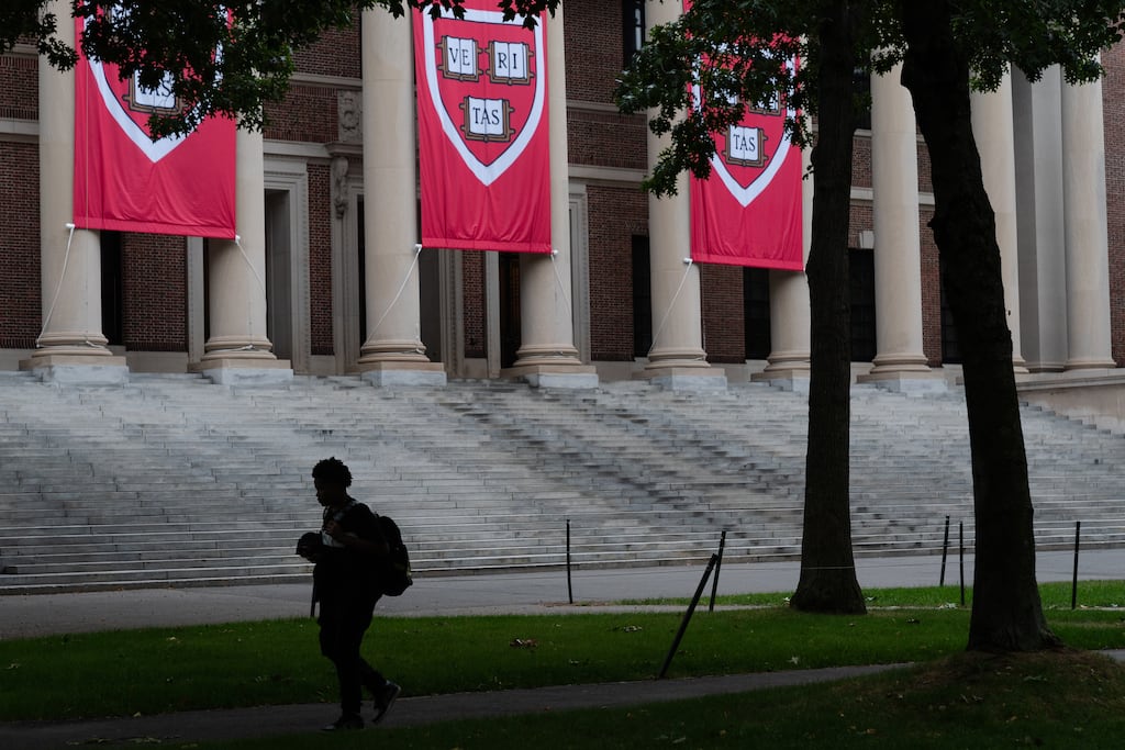 Harvard University is one of a handful of Massachusetts organizations to hire Ballard Partners, a lobbying firm with ties to President Trump.