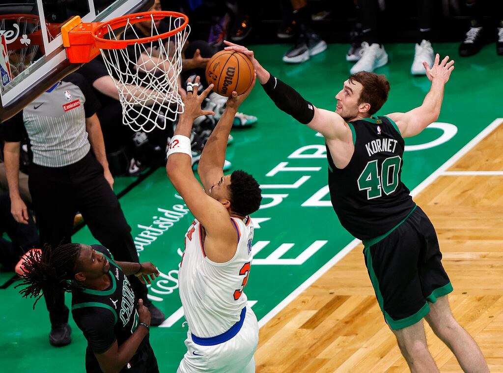 Because the Celtics have his “Bird rights,” Luke Kornet (right) can re-sign with the team without salary cap restrictions. 