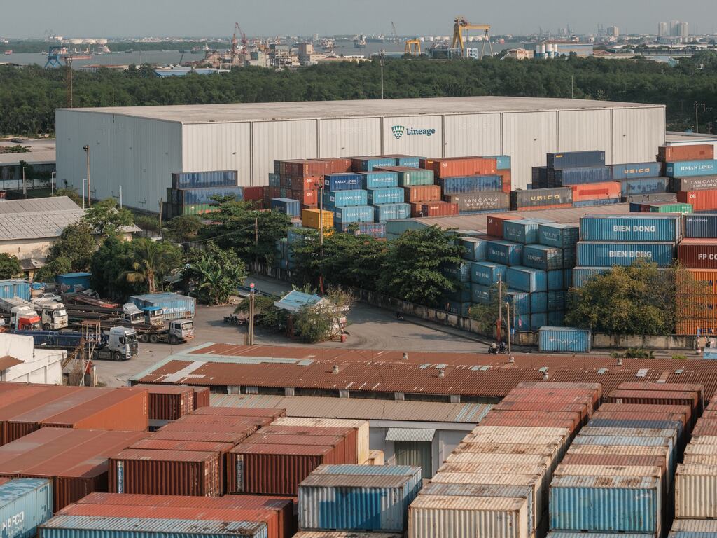 Shipping containers at a port in Ho Chi Minh, Vietnam, on April 28. Many businesses, including Walmart, have said they may have to raise prices as a result of Trump's global trade war.