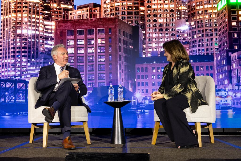 Greater Boston Chamber of Commerce chief executive Jim Rooney chatted with US Chamber chief executive Suzanne Clark at the Boston Chamber's annual meeting.