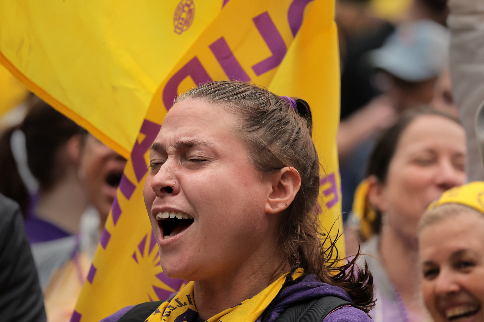 Joanna Futrell, a clerk at Butler Hospital, yells while striking on Thursday.
