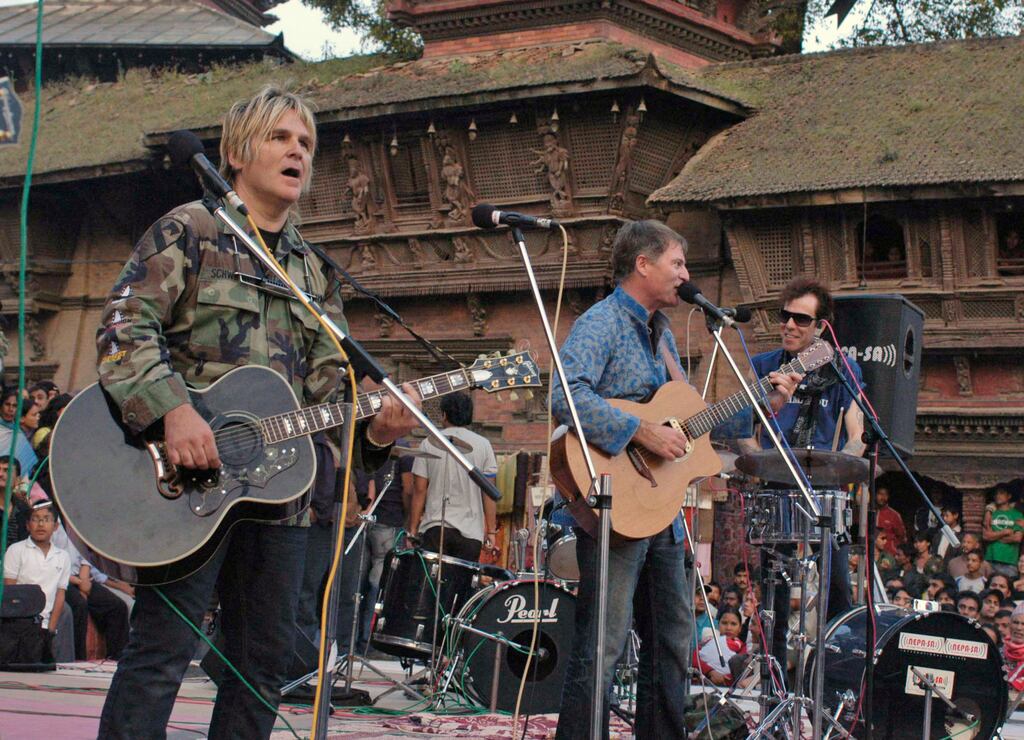 Mr. Peters (left) performed at a concert along with a team of six international rock band at Hanumandhoka Durbar square in Katmandu, Nepal in 2007. The team of musicians had returned from a Mount Everest base camp after performing what they claimed was the world's highest concert on land and raising money for a local cancer hospital. 