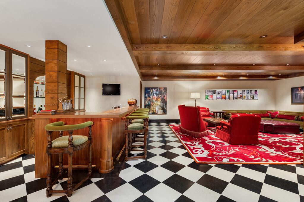 The bar looks onto a seating area.