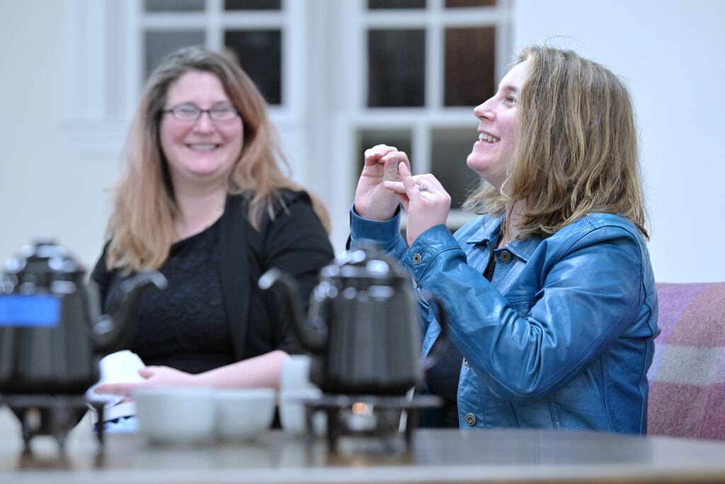 Twin sisters Lily (left) and Hannah Barrett will be organizing an Independent Bookstore Day celebration in Malden.