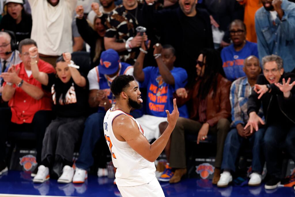 Knicks center Karl-Anthony Towns reacts after making a 3-pointer. Towns scored 21 points for the Knicks in Game 6 of the NBA Eastern Conference finals.
