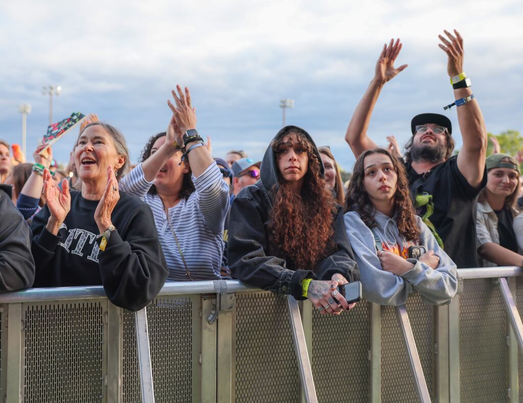 Music fans singing along with Vampire Weekend as the band performed at Boston Calling on Sunday.
