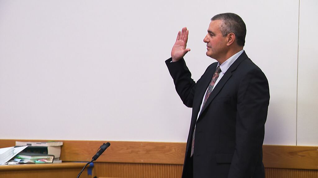 Aaron Thomas is sworn in to testify during his trial on May 2, 2025. (WPRI/Pool)